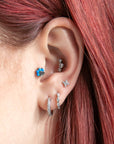 Opal Paw Labret Piercing