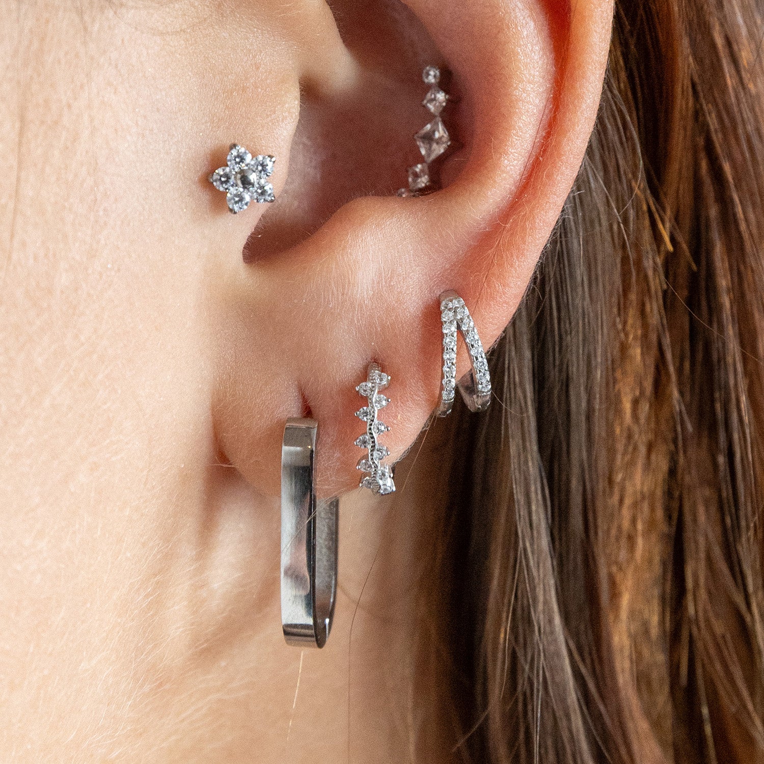 Tiny Flower Tragus Piercing