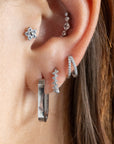 Tiny Flower Tragus Piercing