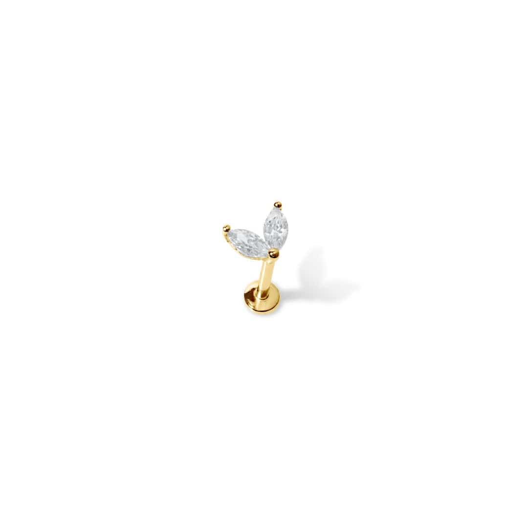14 Carat solid gold leaf piercing with 2 clear cubics zirconia crystals with threaded labret back shown on white background