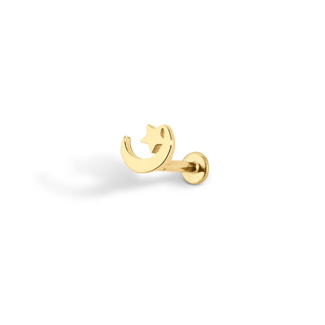 14 Carat gold flat moon and star thread labret piercing shown on white background
